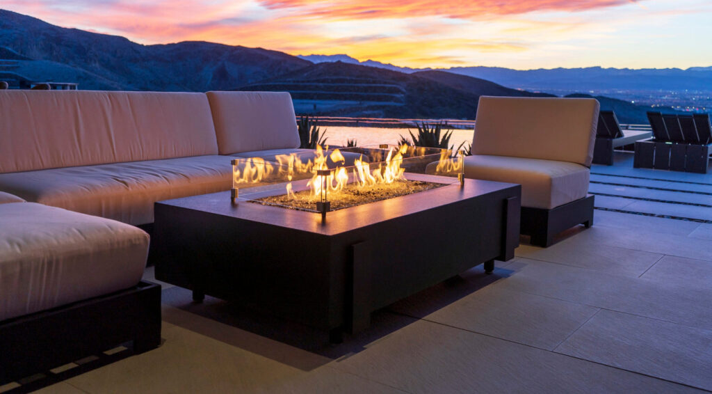American Fyre Designs Iron Saddle Concrete Fire Table with Electronic Ignition